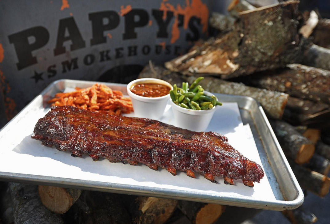 Pappy's Smokehouse signature dishes Dry-Rubbed Pork Ribs, Pulled Pork, Beef Brisket, Smoked Chicken, Sweet Potato Fries.